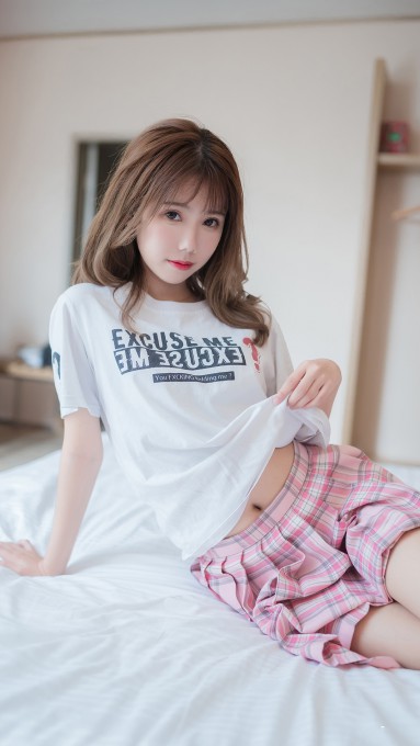 甜美床上美少女手机壁纸图片